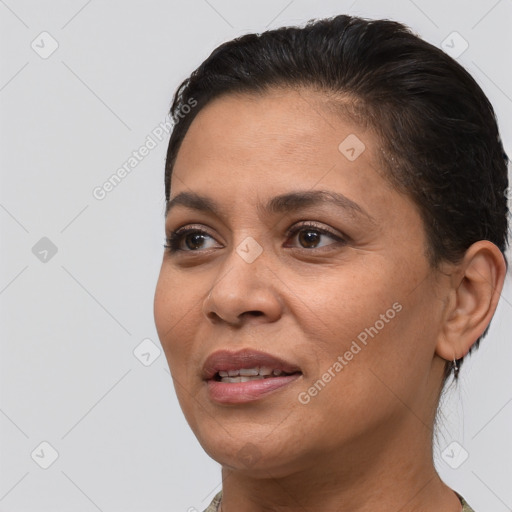 Joyful white adult female with short  brown hair and brown eyes