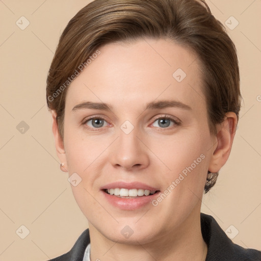 Joyful white young-adult female with short  brown hair and grey eyes