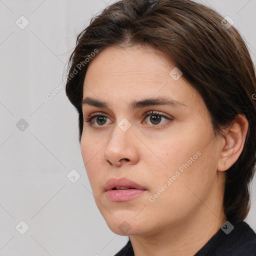 Neutral white young-adult female with medium  brown hair and brown eyes