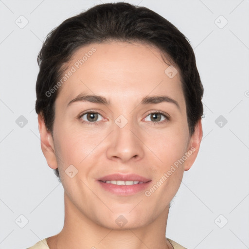 Joyful white young-adult female with short  brown hair and grey eyes