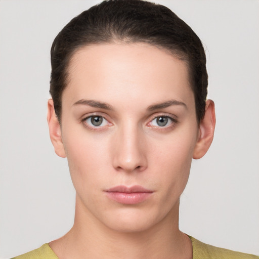 Neutral white young-adult female with short  brown hair and brown eyes