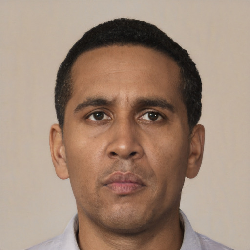 Neutral black adult male with short  black hair and brown eyes