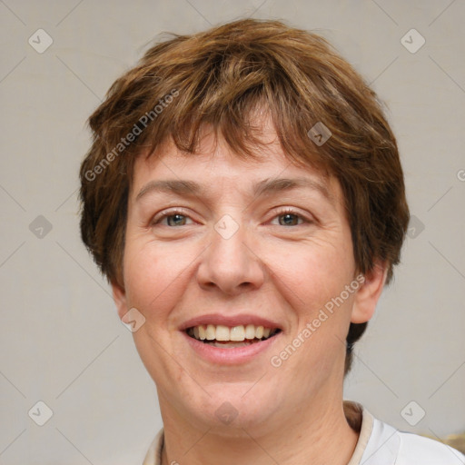 Joyful white adult female with short  brown hair and brown eyes