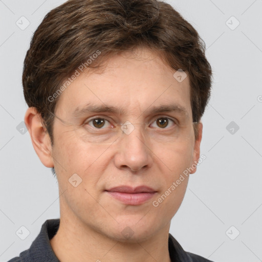 Joyful white adult male with short  brown hair and grey eyes