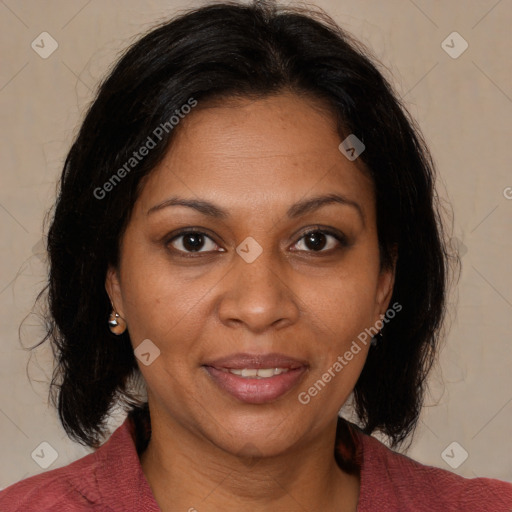 Joyful black adult female with medium  brown hair and brown eyes