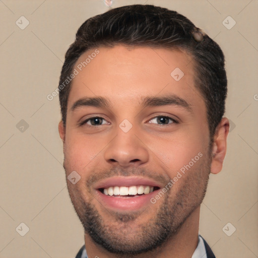 Joyful white young-adult male with short  brown hair and brown eyes