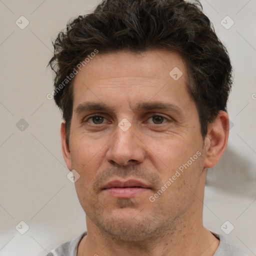 Neutral white adult male with short  brown hair and brown eyes