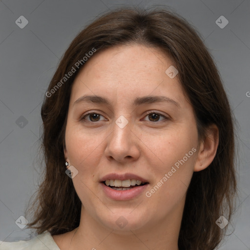 Joyful white young-adult female with medium  brown hair and brown eyes