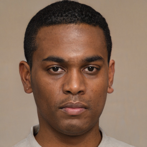 Neutral black young-adult male with short  black hair and brown eyes