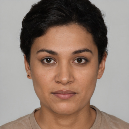 Neutral latino young-adult female with short  black hair and brown eyes