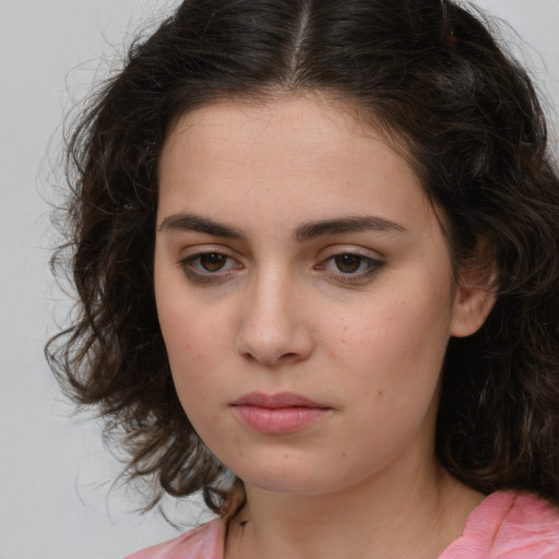 Neutral white young-adult female with medium  brown hair and brown eyes