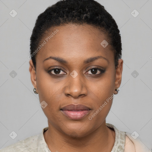 Joyful black young-adult female with short  black hair and brown eyes