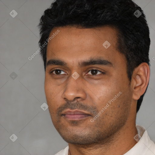 Neutral latino young-adult male with short  black hair and brown eyes