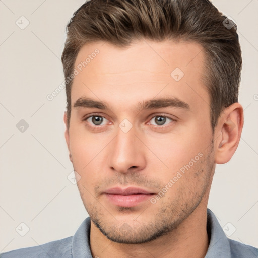 Neutral white young-adult male with short  brown hair and brown eyes