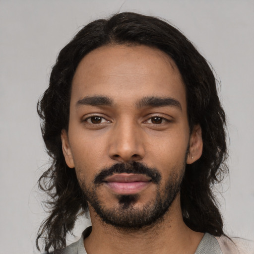 Neutral black young-adult male with medium  black hair and brown eyes