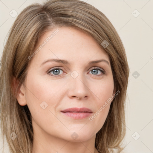 Joyful white young-adult female with long  brown hair and green eyes