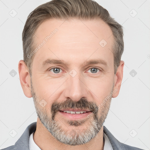 Joyful white adult male with short  brown hair and grey eyes