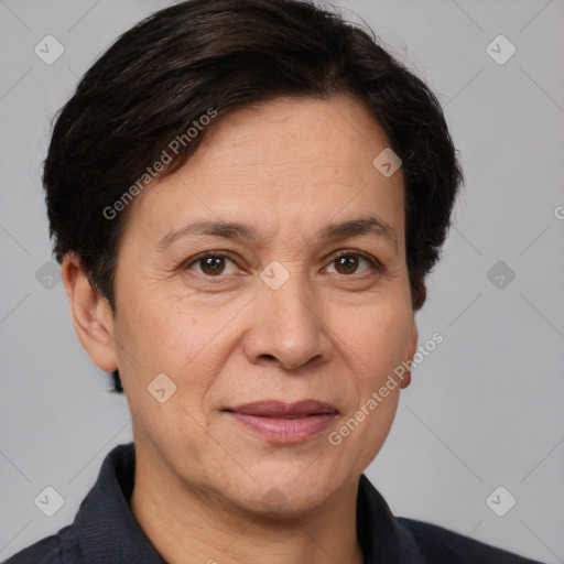 Joyful white adult female with short  brown hair and brown eyes