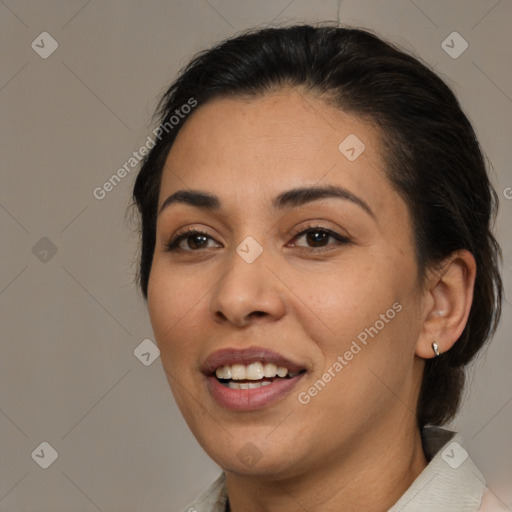 Joyful latino young-adult female with medium  brown hair and brown eyes