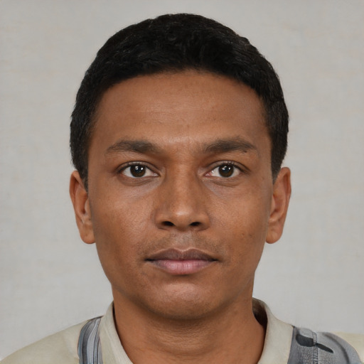 Neutral black young-adult male with short  black hair and brown eyes