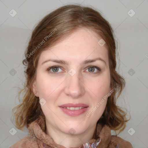 Joyful white young-adult female with medium  brown hair and blue eyes