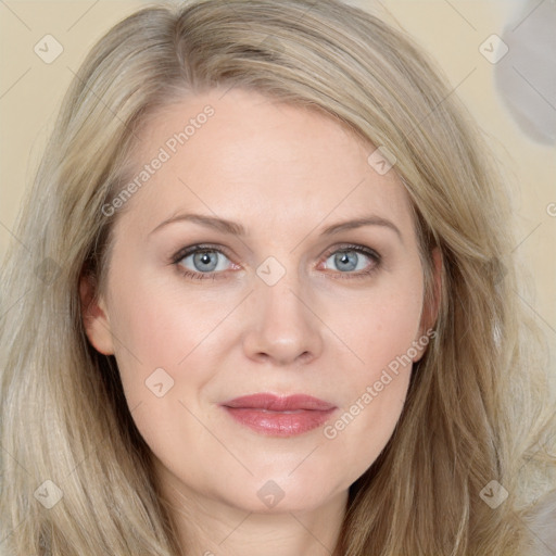 Joyful white young-adult female with long  brown hair and blue eyes