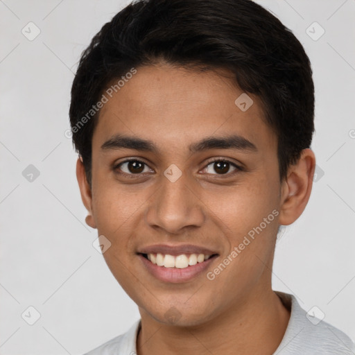 Joyful latino young-adult male with short  black hair and brown eyes