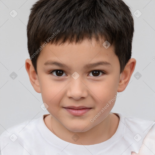 Joyful white child male with short  brown hair and brown eyes