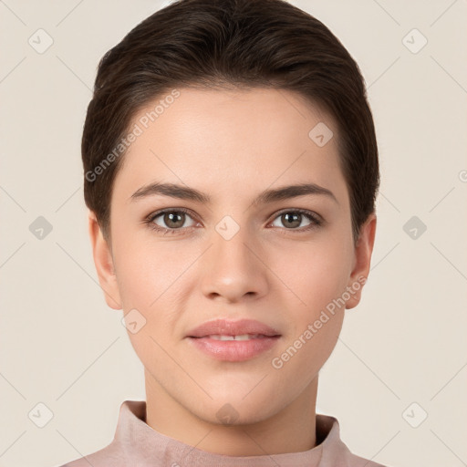 Joyful white young-adult female with short  brown hair and brown eyes