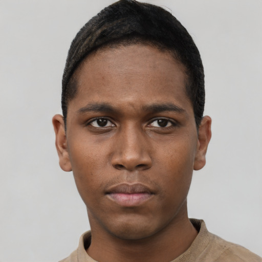 Neutral black young-adult male with short  black hair and brown eyes