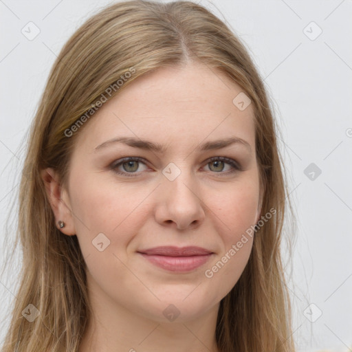 Joyful white young-adult female with long  brown hair and grey eyes