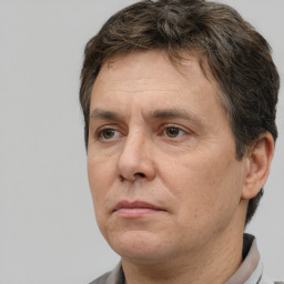 Neutral white adult male with short  brown hair and brown eyes