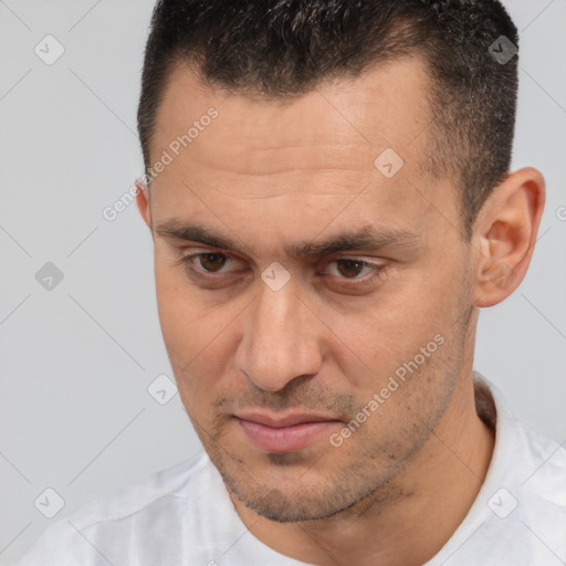 Joyful white adult male with short  brown hair and brown eyes