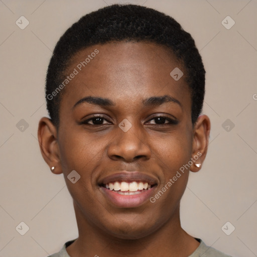 Joyful black young-adult female with short  black hair and brown eyes