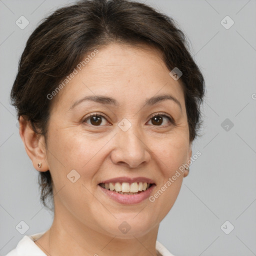 Joyful white adult female with short  brown hair and brown eyes