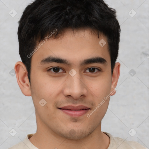 Joyful asian young-adult male with short  brown hair and brown eyes