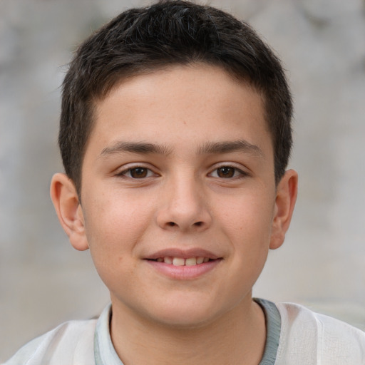 Joyful white child male with short  brown hair and brown eyes