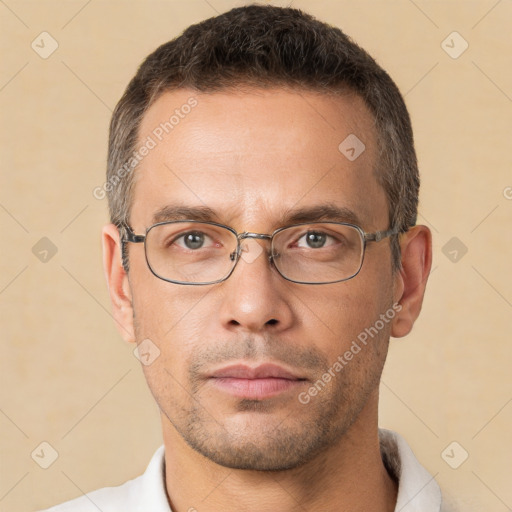 Neutral white adult male with short  brown hair and brown eyes