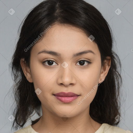 Joyful latino young-adult female with medium  brown hair and brown eyes