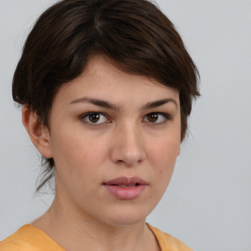 Neutral white young-adult female with medium  brown hair and brown eyes