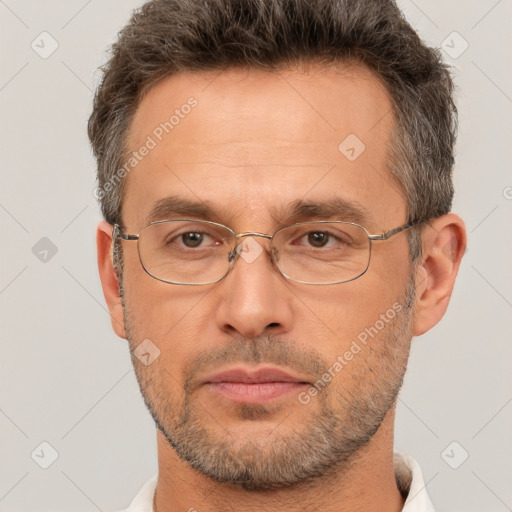 Neutral white adult male with short  brown hair and brown eyes