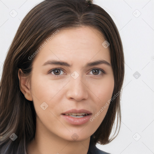 Neutral white young-adult female with long  brown hair and brown eyes