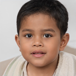 Joyful white child male with short  brown hair and brown eyes