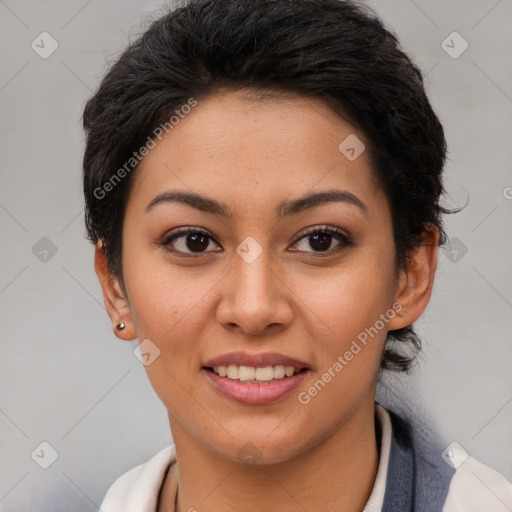 Joyful latino young-adult female with short  brown hair and brown eyes