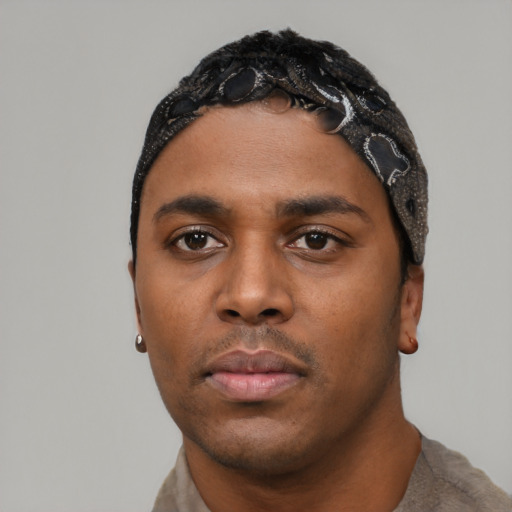 Neutral black young-adult male with short  black hair and brown eyes