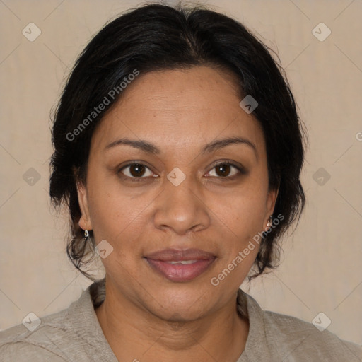 Joyful black adult female with medium  brown hair and brown eyes