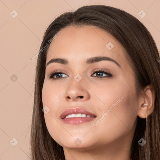 Joyful white young-adult female with long  brown hair and brown eyes