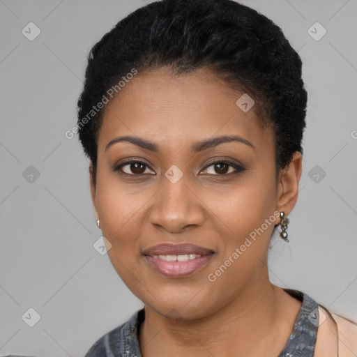 Joyful black young-adult female with short  black hair and brown eyes