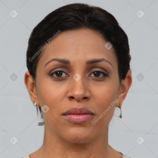 Joyful latino young-adult female with short  brown hair and brown eyes