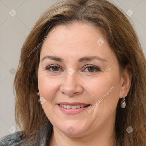 Joyful white adult female with medium  brown hair and brown eyes